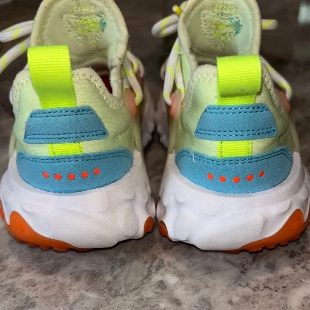Nike Yellow and Blue React Sneakers Dynamic Design